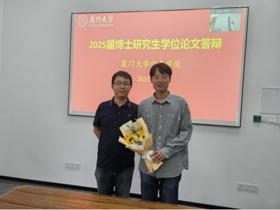 苏劲松老师与博士毕业生王安特同学合影